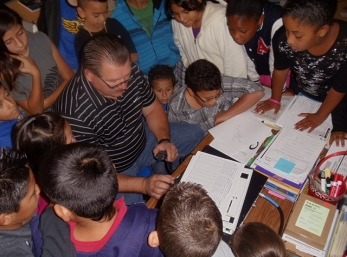 David explains that a log book must be kept to record information gathered while making contacts.