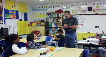 David explains to students how he became a ham radio operator.