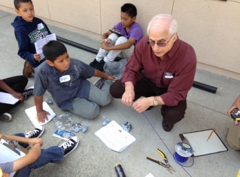 Jay showed us how to strip the outside coating off the wire.